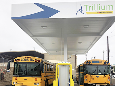school buses fueling up with CNG at Trillium's station in LA County