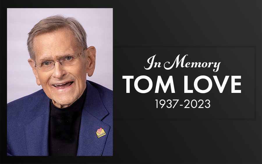 A photo of Tom Love with the words "In Memory, 1937-2023"