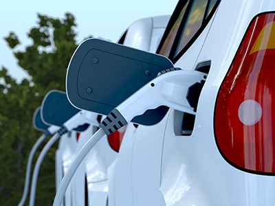 Stock photo of an EV chargers in cars